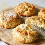 Irish soda bread scone cut open to reveal soft, crumbly interior