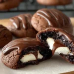 Decadent gluten free hot cocoa cookies topped with marshmallow fluff.