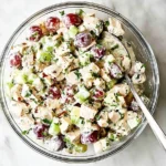 Delicious chicken salad served in a bowl with fresh ingredients